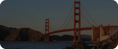 Golden Gate Bridge over San Francisco Bay with orange tones