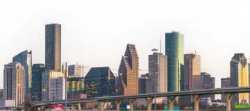 Houston, Texas, skyline with tall buildings and highway bridge