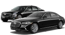 Two black luxury sedans, a Mercedes-Benz and a Cadillac, shown side-by-side against a neutral background.